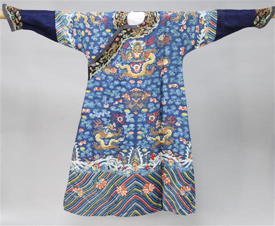 A Chinese blue satin embroidered silk and metal thread dragon robe, Jifu, late 19th / early 20th century,